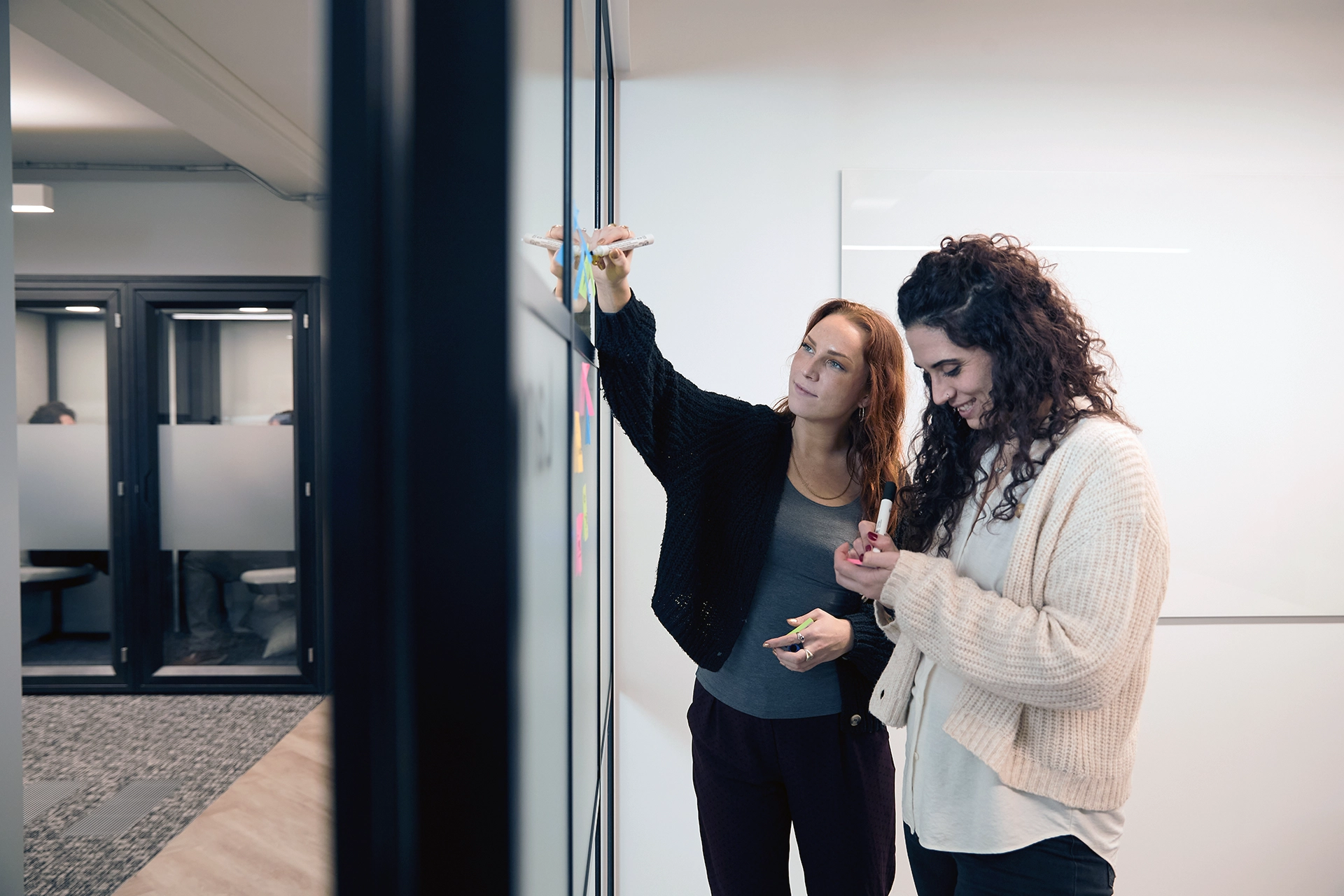 Two women working at Adaptive
